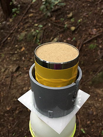 Fig1. Splash cup before (left)  rainfall. 